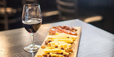 glass of wine and charcuterie